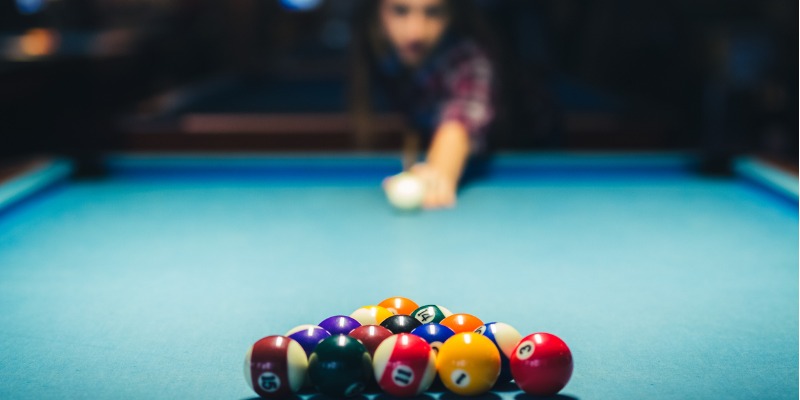 Woman playing pool