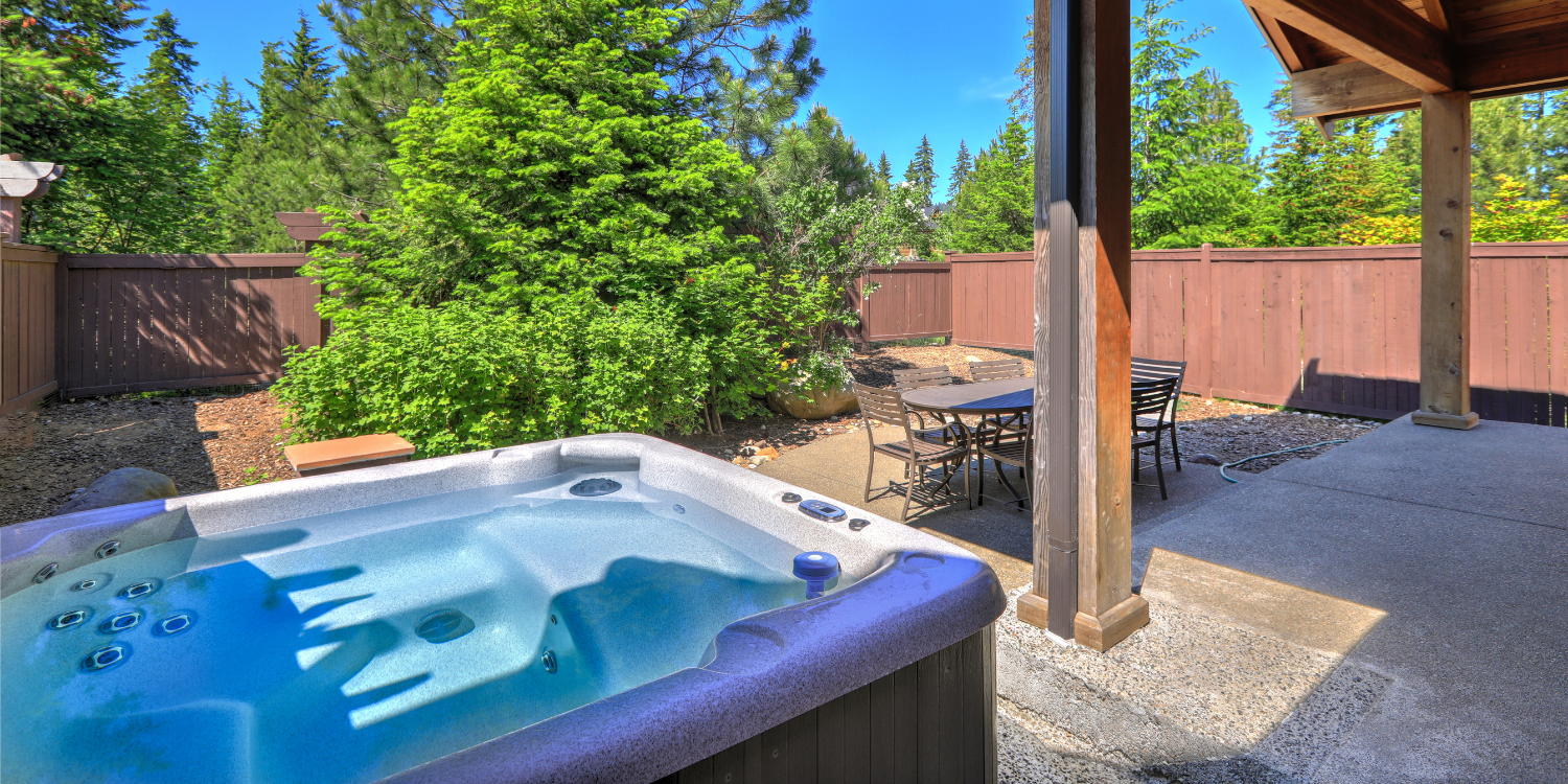 Hot Tub in backyard in the summer - The Ultimate Guide to Positioning Your Hot Tub for Privacy